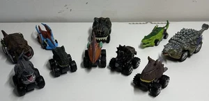 10 Dinosaurier Autos Konvolut (einige sind Rückzugautos) - Bild 1 von 3