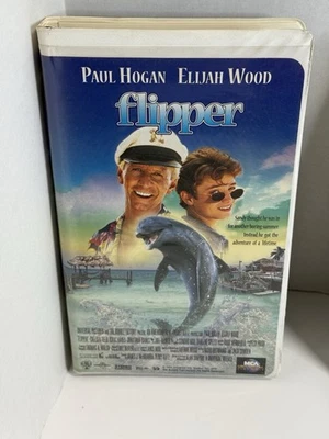 Universal Flipper Paul Hogan Elijah Wood VHS Clam Shell Case - Image 1 of 2