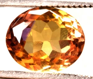 11,80 Cts. Piedra preciosa natural bicolor Bolivia ametrino forma ovalada certificada - Imagen 1 de 4