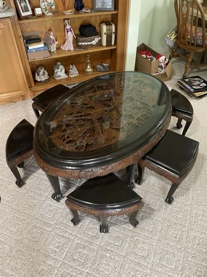 Mesa ovalada de madera de teca tallada a mano con 6 taburetes diseño tallado profundo tamaño 50x30x20 Foto 1 de 4