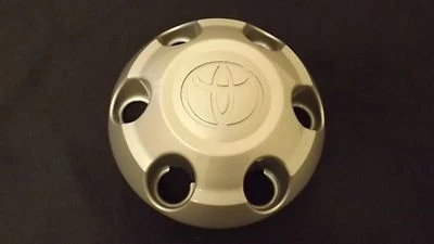 Tapa central de rueda Toyota Tacoma OEM acabado plateado 4260B-04010 Foto 1 de 2