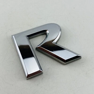 2007-2012 Nissan Versa Hatchback emblema logotipo carta emblema porta porta porta porta traseira G1R - Imagem 1 de 4