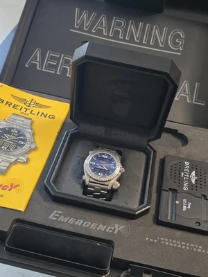 Breitling Emergency E76321 esfera azul, ¡juego completo! Reloj aero titanio para hombre 43 mm Foto 1 de 4