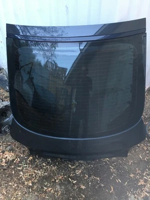 Audi A7 Quattro 2012-2018 tapa trasera maletero escotilla OEM negro con vidrio instalado Foto 1 de 4