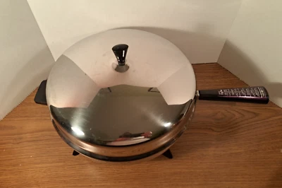 Farberware Sartén Eléctrica Revestida de Aluminio Inoxidable 12” Tapa Domo 310B/312B Foto 1 de 4