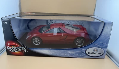 Cadillac Cien 100 % Hot Wheels rojo escala 1:18 rojo fundido a presión nuevo en caja Foto 1 de 4