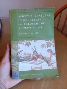 Alice adventures in Wonderland and through the looking glass by: Lewis Caroll  - Picture 1 of 13