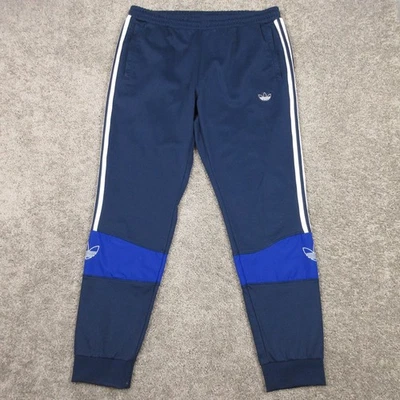 Calça Adidas Track Masculina Grande Logotipo Trefoil Azul 3 Listradas Joggers Aquecimento Esportivo - Imagem 1 de 4