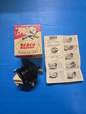 Carrete de pesca giratorio Zebco 202 vintage de fundición de cebo Foto 1 de 3