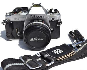 Nikon FG avec Objectif Nikkor 50mm 1: 1.8 + sangle & notice - Testé Ok
