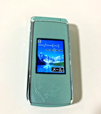 Teléfono celular plegable japonés Docomo F-09B verde menta FOMA Garakei Keitai retro jp Foto 1 de 4
