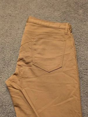 Pantalones de mezclilla elásticos ajustados Banana Republic para hombre 35x30 amarillo panal Traveler Foto 1 de 4