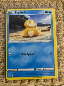 Pokémon-Evolving Skies- Psyduck 24/185 Error Misprint/Miscut alignment dot NM - Picture 1 of 2