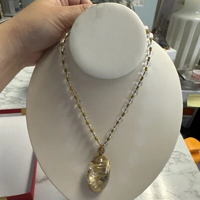 Colgante de cristal de titanio natural Foto 1 de 4