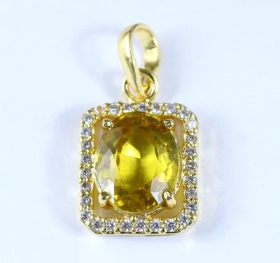 天然黄色蓝宝石 9.73 克拉椭圆形宝石认证男式吊坠 观看视频 — 第 1/4 张图片