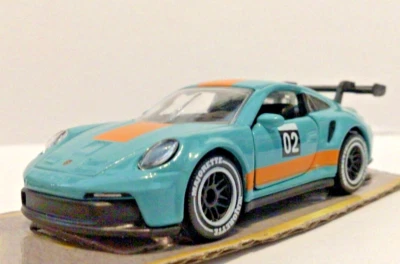 Majorette PORSCHE 911 GT3 Cup (992) AQUA aprox escala 1:64 SIN USAR Foto 1 de 4