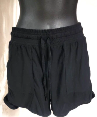 Pantalones Cortos Athletic Works Para Mujer Talla XS Negros Suaves Gimnasio Pista Bolsillos Cintura Elástica Foto 1 de 4