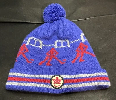 De colección Roots Canada Sombrero Pom Gorro Toque Ropa Compañía Hockey Logo Tejido Gorra Azul Foto 1 de 4