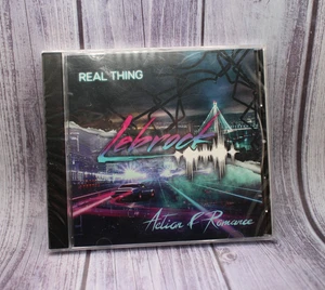 RARE Lebrock - Real Thing / Action & Romance CD Album FIXT Synthwave SEALED New - Foto 1 di 3