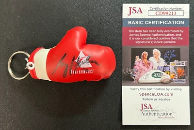 Larry Holmes SIGNED Mini Boxing Glove Keychain w/COA Boxing Hall of Famer! - Image 1 of 4