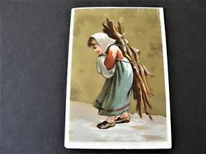 Ha llegado el invierno - la chica lleva un brazo lleno de leña en la espalda - Tarjeta de canje. - Imagen 1 de 2