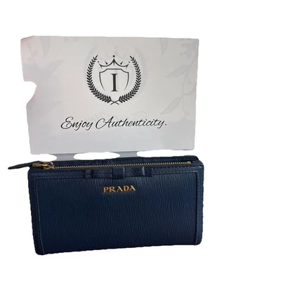 Prada Wallet Navy Blue Textured Leather with gold hardware and a bow detail - Image 1 of 4