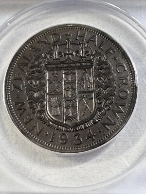 Nueva Zelanda 1934 media corona graduada XF 40 por ANACS Foto 1 de 4