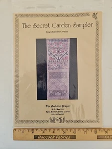 The Needle's Prayse THE SECRET GARDEN SAMPLER Pattern by Darlene O'Steen - Picture 1 of 3