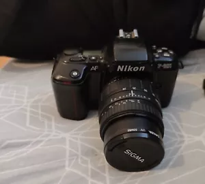 Nikon F-601 AF Analoge Spiegelreflexkamera/28-70mm SIGMA - Imagen 1 de 4