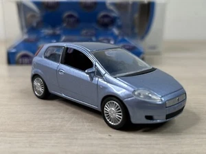 FIAT NUOVA PUNTO NOREV 1/43. AZUL CLARO. ALMACENADO EN CAJA. LIMPIO - Imagen 1 de 6