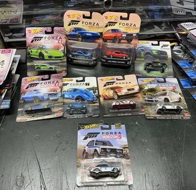 Hot Wheels Forza Audi RS 6 Avant, Nissan, Mitsubishi, Porsche Lote de 9 Etc Foto 1 de 4