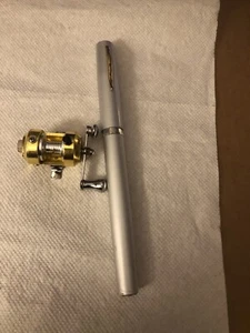 "Carrete de pesca en miniatura ST5RL con caña telescópica 33""" - Imagen 1 de 9