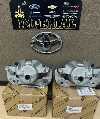 2012-2017 TOYOTA PRIUS V NEW FRONT GENUINE OEM  BRAKE CALIPERS WITH PISTONS - Image 1 of 4