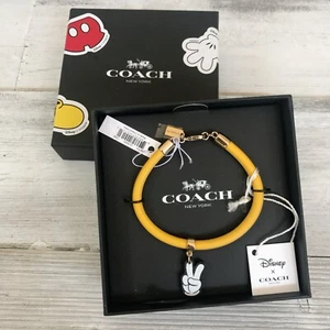 COACH X DISNEY Mickey Yellow Leather Bracelet Peace Sign Charm Authentic New - Picture 1 of 4