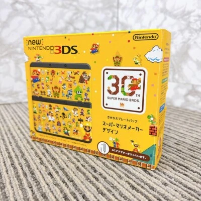 Nuevo sistema portátil Nintendo 3DS Super Mario Design amarillo edición limitada Foto 1 de 2
