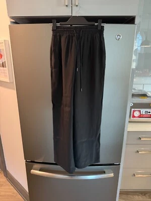 Pantalones de seda ATM negros de pierna ancha cintura elástica - talla XS nuevos Foto 1 de 2