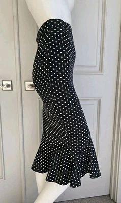 Falda midi ajustada elástica sin marca a lunares parte inferior fluida talla S Foto 1 de 4