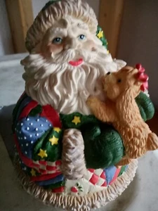 Navidad Musical Giratorio Papá Noel Sosteniendo Cachorro "Aquí viene Papá Noel" - Imagen 1 de 8