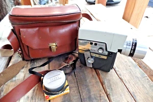 Cámara de cine con zoom de potencia de película 8 instalado y un bote de película. Vintage - Imagen 1 de 8