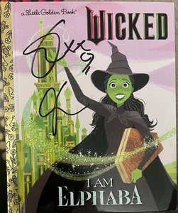 Piccolo libro d'oro firmato Wicked CYNTHIA ERIVO E JON CHU - VIDEO PROOF - Foto 1 di 1