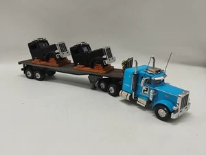 Matchbox Ultra 1:58 Scale Paclease Peterbilt 359 KS192 SA Flatbed Transporter - Picture 1 of 12