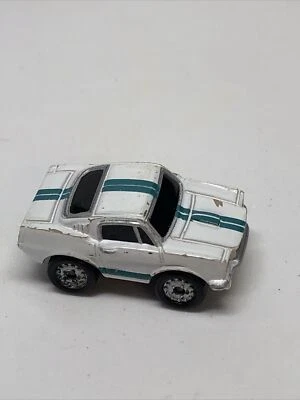 Small Micro Machine Plastic 1965 style Ford Mustang in White & Green Stripes - Image 1 of 4