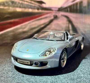 Porsche Carrera GT Cabrio 1:18 Maisto gris metálico - excelente estado - Imagen 1 de 23