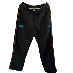 Pantalones deportivos Nike Jordan Flight polar para hombre M negro azul logotipo naranja tubería - Imagen 1 de 6