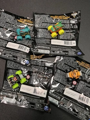 Monster Jam Mini Series 19 Lot Of 4. 2 Chase, 2 common, Digatron dragon - Image 1 of 4