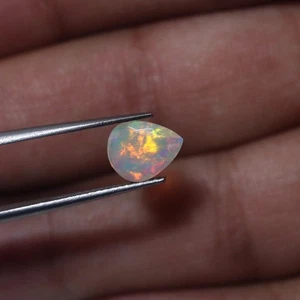 0.70 Cts 8.6x6.9 MM Natural AAA Red Yellow Fire Ethiopian Opal Pear Cut Gemstone - Foto 1 di 10