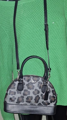 Bolso Bandolera Coach Mini Cora Domed Estampado Ocelote y Lona Recubierta F36219 Foto 1 de 4