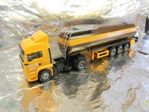 ** Herpa 148238 MAN TGA LX Bitumen Tanker Semitrailer Baufeld 1:87 HO Scale - Picture 1 of 2