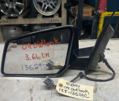 Espejo retrovisor lateral Saturn Outlook 2009-2010 eléctrico térmico manual plegable fabricante de equipos originales Foto 1 de 4