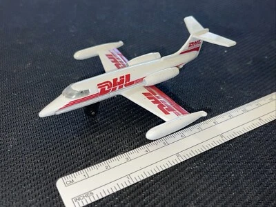Matchbox Skybusters Learjet DHL Courier 1973 SB1 10,5 cm de largo 4,5” avión superior jet Foto 1 de 4